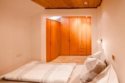 Ein Bett oder Betten in einem Zimmer der Unterkunft Ferienwohnung Kogler