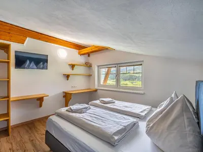 Ein Bett oder Betten in einem Zimmer der Unterkunft Apartment Mawa by Interhome