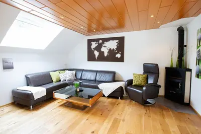 Ein Sitzbereich in der Unterkunft Appartement Riedingtal
