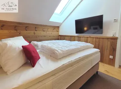 Ein Bett oder Betten in einem Zimmer der Unterkunft Mountain Suite A10 - by FiS