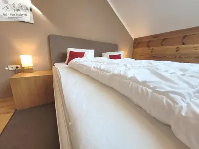 Ein Bett oder Betten in einem Zimmer der Unterkunft Mountain Suite A10 - by FiS