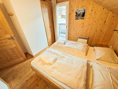 Ein Bett oder Betten in einem Zimmer der Unterkunft Kreischberg 14b