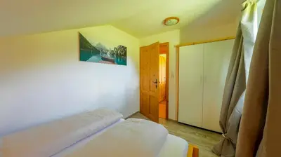 Ein Bett oder Betten in einem Zimmer der Unterkunft Haus Röthelsteinblick