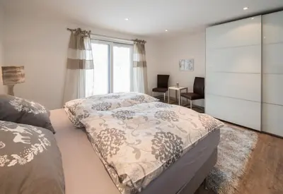 Ein Bett oder Betten in einem Zimmer der Unterkunft Apartmenthaus Mountainvista