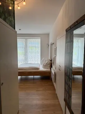 Ein Bett oder Betten in einem Zimmer der Unterkunft Seepanorama an der Esplanade 2