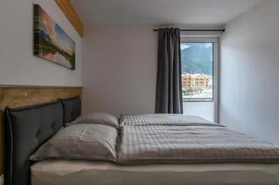 Ein Bett oder Betten in einem Zimmer der Unterkunft Ferienwohnung Klugis