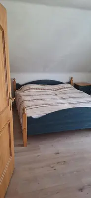 Ein Bett oder Betten in einem Zimmer der Unterkunft Haus Anna & Georg