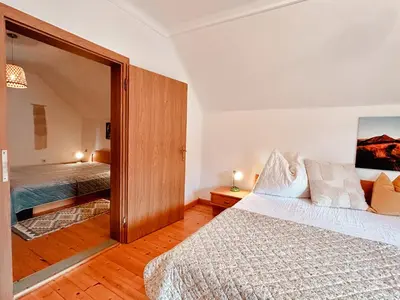 Ein Bett oder Betten in einem Zimmer der Unterkunft CHILLHAUS Pear Mountain by AA Holiday Homes