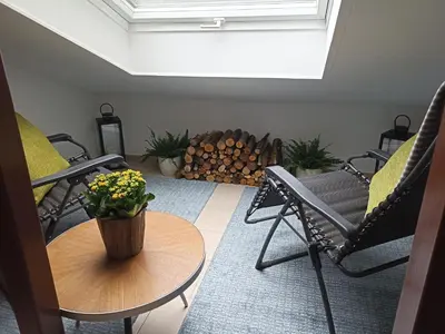 Ein Sitzbereich in der Unterkunft Ferienwohnung Mayrhofer