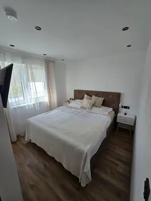 Ein Bett oder Betten in einem Zimmer der Unterkunft Anni