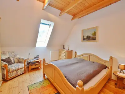 Ein Bett oder Betten in einem Zimmer der Unterkunft Chalet in Einach nahe Skipisten