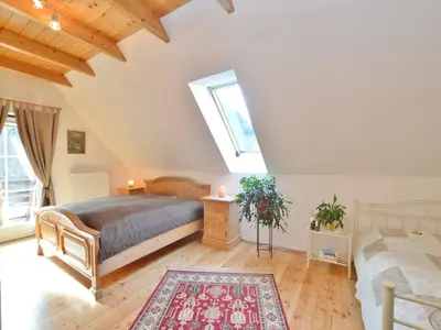 Ein Bett oder Betten in einem Zimmer der Unterkunft Chalet in Einach nahe Skipisten