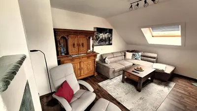 Ein Sitzbereich in der Unterkunft Apartmenthaus Kammblick