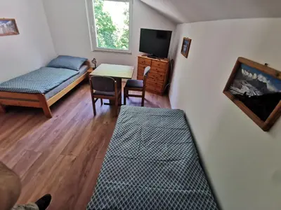 Ein Bett oder Betten in einem Zimmer der Unterkunft Ferienwohnungen Steinbichl