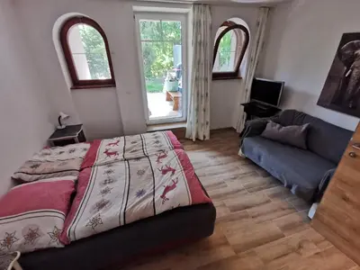 Ein Bett oder Betten in einem Zimmer der Unterkunft Ferienwohnungen Steinbichl