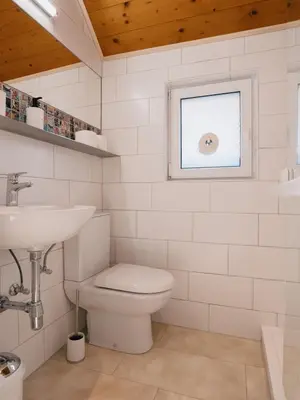 Ein Badezimmer in der Unterkunft VOGIHAISL