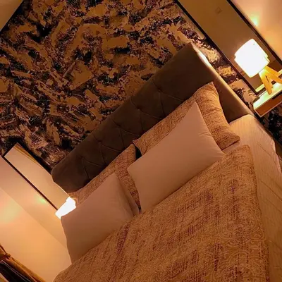 Ein Bett oder Betten in einem Zimmer der Unterkunft Noor Lux Apartments