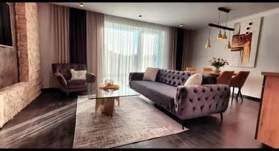 Ein Sitzbereich in der Unterkunft Noor Lux Apartments