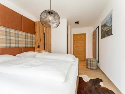 Ein Bett oder Betten in einem Zimmer der Unterkunft Grebenzen Lodge 51B