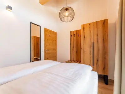 Ein Bett oder Betten in einem Zimmer der Unterkunft Grebenzen Lodge 51A