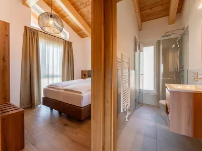 Ein Bett oder Betten in einem Zimmer der Unterkunft Grebenzen Lodge 51A