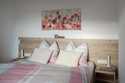 Ein Bett oder Betten in einem Zimmer der Unterkunft Miglurahof