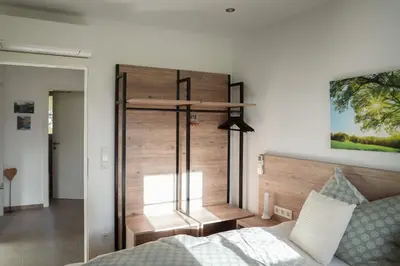 Ein Bett oder Betten in einem Zimmer der Unterkunft Miglurahof
