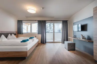Ein Bett oder Betten in einem Zimmer der Unterkunft T-Lodge Zauchensee