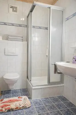 Ein Badezimmer in der Unterkunft Ferienwohnung Fliegenpilz