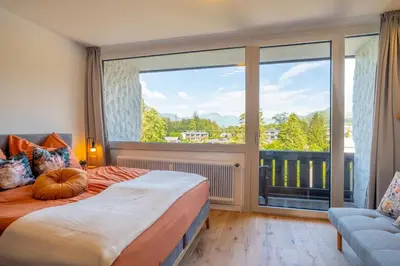 Ein Bett oder Betten in einem Zimmer der Unterkunft Suite Apartment modern getaway - Neu renoviert - Strobl am Wolfgangsee