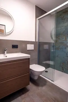 Ein Badezimmer in der Unterkunft Suite Apartment modern getaway - Neu renoviert - Strobl am Wolfgangsee