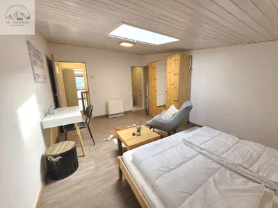 Ein Bett oder Betten in einem Zimmer der Unterkunft Apartment Panoramablick Tauplitz