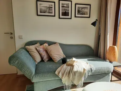 Ein Sitzbereich in der Unterkunft Inspiration - zwei Terrassen, Seeblick, privater Garten