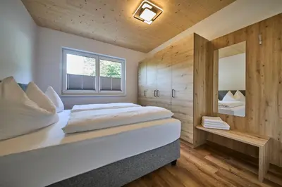 Ein Bett oder Betten in einem Zimmer der Unterkunft Barons Living
