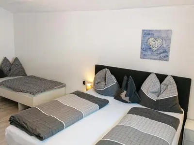 Ein Bett oder Betten in einem Zimmer der Unterkunft Apartment Tobias 2 by Interhome