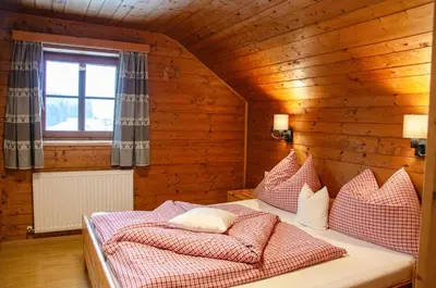 Ein Bett oder Betten in einem Zimmer der Unterkunft Stoanerhof