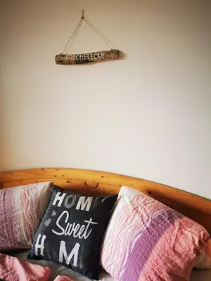 Ein Bett oder Betten in einem Zimmer der Unterkunft Ferienwohnung am Steínbrecherhof