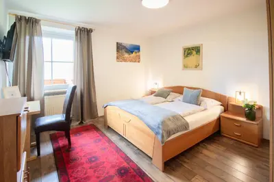 Ein Bett oder Betten in einem Zimmer der Unterkunft Appartementhaus Hoamart Appartements