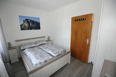 Ein Bett oder Betten in einem Zimmer der Unterkunft Ferienwohnung Sölkner