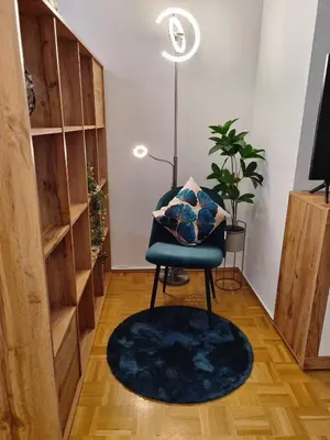 Ein Sitzbereich in der Unterkunft Apartment Crema