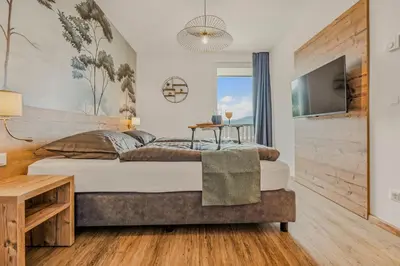 Ein Bett oder Betten in einem Zimmer der Unterkunft Ski-In&Out auf 1641m, Sauna, Tiefgarage
