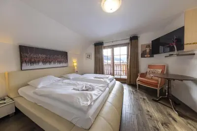 Ein Bett oder Betten in einem Zimmer der Unterkunft Panorama Chalet Taurachtal
