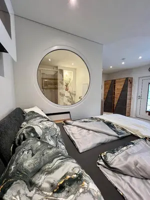 Ein Bett oder Betten in einem Zimmer der Unterkunft Premium-Wohlfühlappartement Schladming-Dachstein