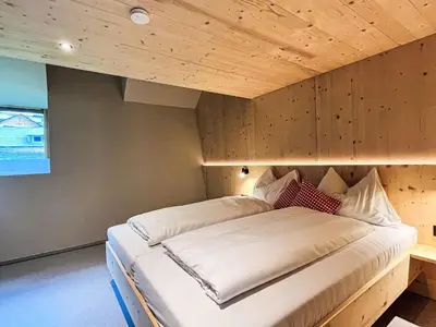 Ein Bett oder Betten in einem Zimmer der Unterkunft Apartment Hideaway Planneralm by Jufa Hotels-2 by Interhome