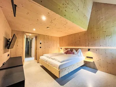 Ein Bett oder Betten in einem Zimmer der Unterkunft Apartment Hideaway Planneralm by Jufa Hotels-3 by Interhome