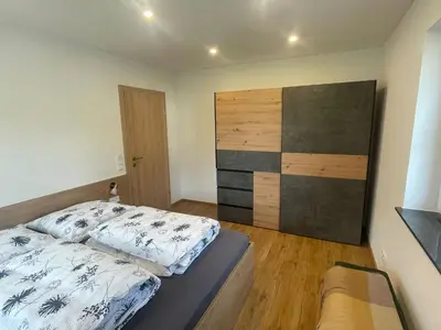 Ein Bett oder Betten in einem Zimmer der Unterkunft Ferienwohnungen Steindl