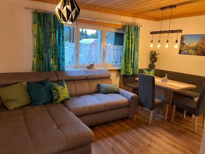 Ein Sitzbereich in der Unterkunft Ferienhaus Romantika