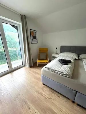 Ein Bett oder Betten in einem Zimmer der Unterkunft Dark Sky ONE