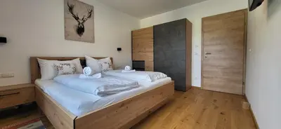 Ein Bett oder Betten in einem Zimmer der Unterkunft SFischbacher App 1 by Alpenidyll Apartments