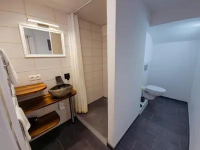 Ein Badezimmer in der Unterkunft Appartement OTTL 3